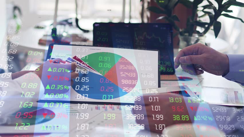 Traders analyzing and studying stock market financial statements