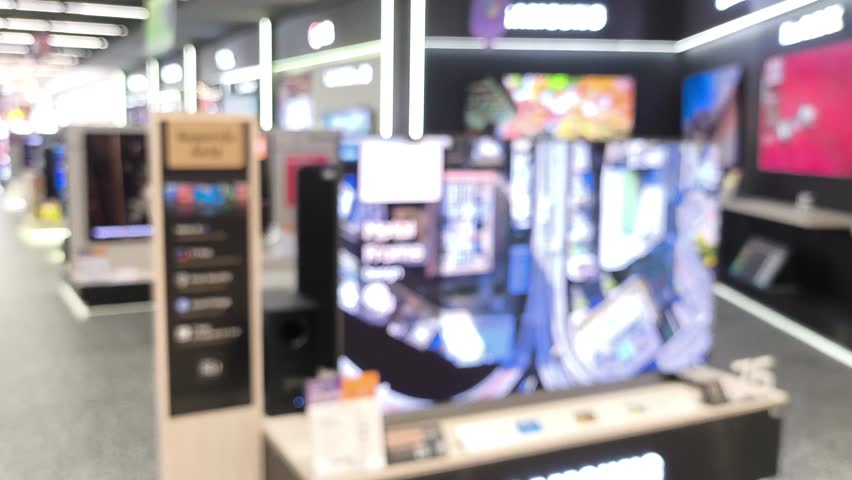 Blurred Television showroom in the shopping mall.