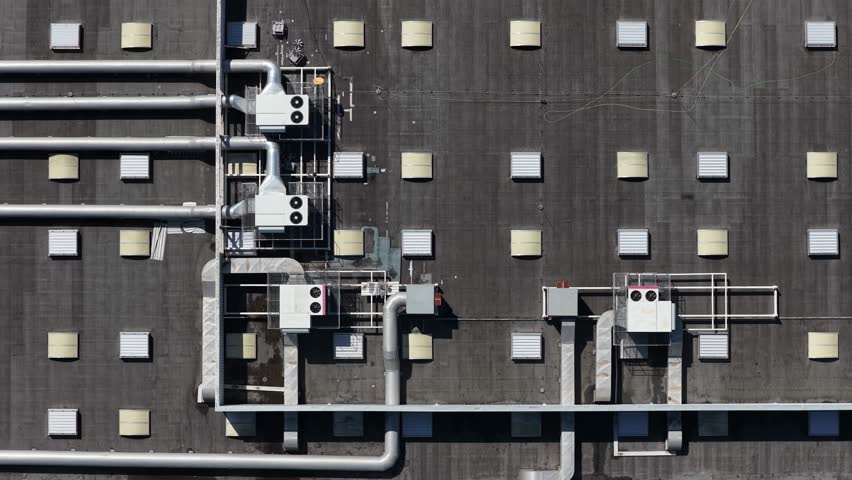 Air conducts and ventilation system on warehouse rooftop