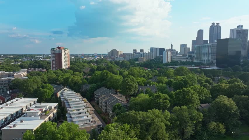 Aerial view of Atlanta city skyline buildings with parks and green trees, Georgia