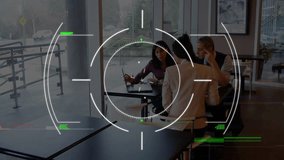 Animation of scope and data processing over diverse business people in office. Global business, finance, computing and data processing concept digitally generated video. - Powered by Shutterstock - Get 15% off with code: PIKWIZARD15