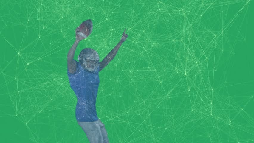 Grabbing football, player pointing skyward celebrating in sports with green network lines pulsing. Athlete, victory, enthusiasm, digital, dynamic, strength, achievement
