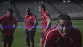 As binary code scrolling on screen, rugby player shifting delivering shout for team in tech demo. Athletic, teamwork, innovation, motivational, sportswear, digital, intensity - Powered by Shutterstock - Get 15% off with code: PIKWIZARD15