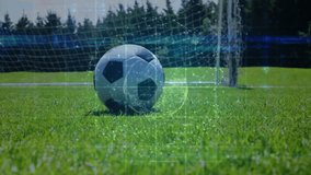 Foot tapping soccer ball overlaying keeper diving securing it defending goal opponent stepping over. Athletic, sports, competition, action, outdoor, intensity, agility - Powered by Shutterstock - Get 15% off with code: PIKWIZARD15