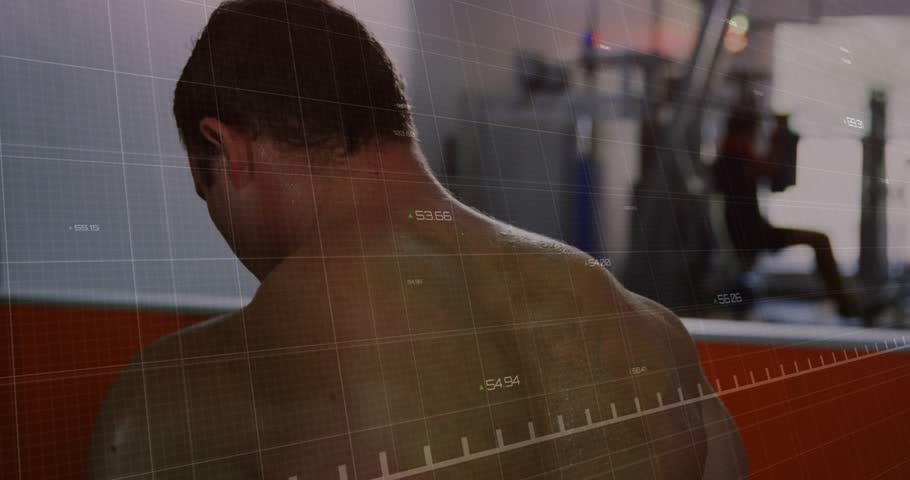 Male gymgoer gripping machine handles extending arms, red graph syncing to exertion while panning. Fitness, strength, workout, musculature, training, performance, endurance
