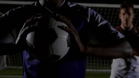 two players holding ball at goal as finance overlay appearing over them, reflecting market shifts. Soccer, athleticism, digital, technology, competition, stadium, forecast - Powered by Shutterstock - Get 15% off with code: PIKWIZARD15