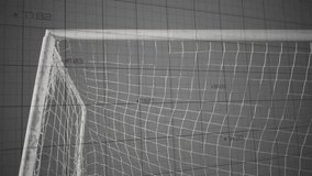 Goalkeeper tracking ball and leaping for save under net while sports graphs rising across grid. Athletic, motion, technology, performance, training, dynamic, competitive - Powered by Shutterstock - Get 15% off with code: PIKWIZARD15