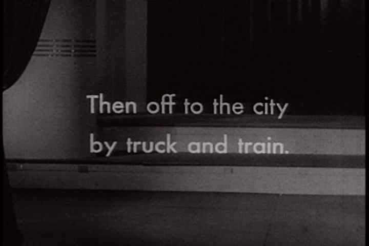 1930s - Trains and trucks take milk to market where it is inspected before distribution in 1934.