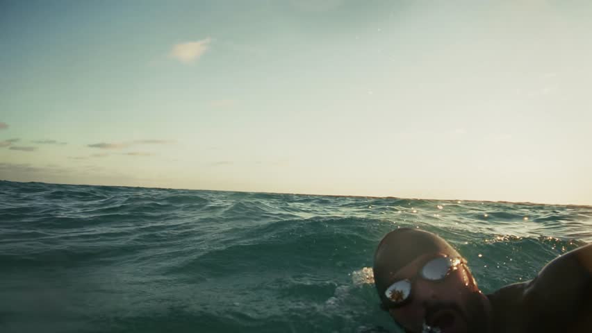 Triathlete Sports Recreation Swimming Workout. Triathlete Swim Endurance Sport Triathlon Competition. Swimmer Workout Training Triathlon Competition In Open Water. Swimmer Sport Recreation Exercising