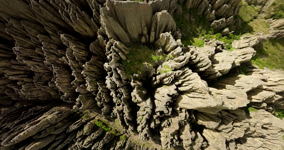 Rock formations in Valle de las Animas, Valley of the Souls, unique geological spires and abstract patterns near La Paz, Bolivia. Aerial top-down descending