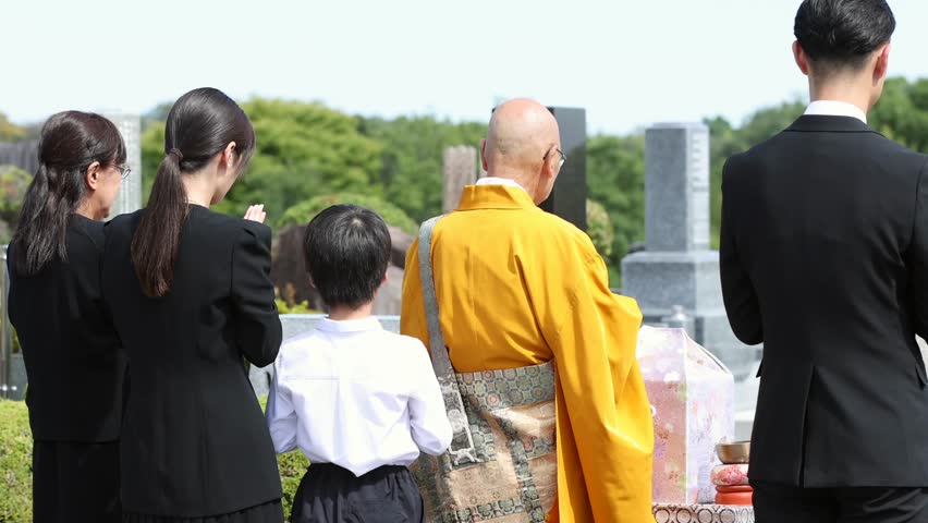 Family members attending a Japanese-style funeral