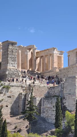 Detailed view of the Acropolis of Athens during golden hour, with the Parthenon and Erechtheion temples illuminated by sunset light. soft golden tones, UNESCO World Heritage Sites 