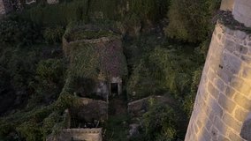 Abandoned Stone Houses Covered in Greenery in Porto, Portugal – Aerial View - Powered by Shutterstock - Get 15% off with code: PIKWIZARD15