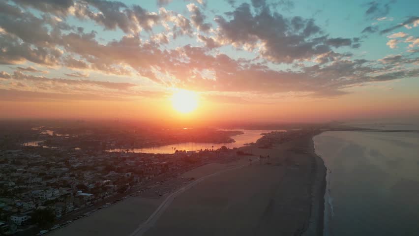 Long Beach sunrise aerial over the Pacific coastline, California