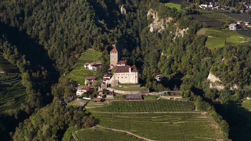 Tyrol Castle Schloss Tirol or Castel Tirolo, in South Tyrol, Italy, aerial video
