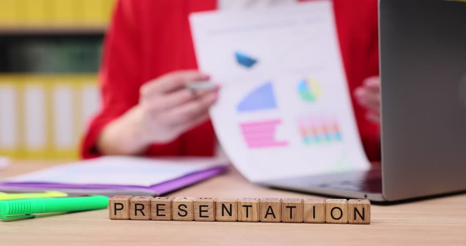 Creative preparation for a stunning business presentation with colorful graphics and charts in a bright office setting