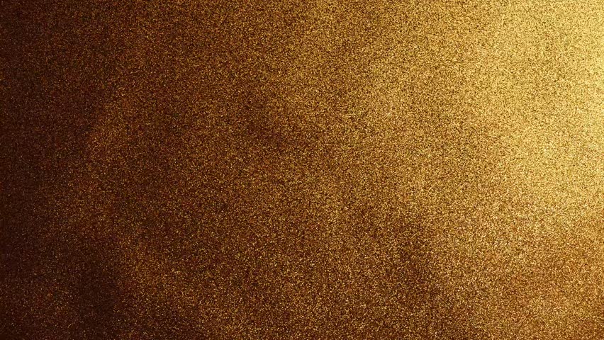 A shimmering golden glitter background creates an endless loop effect, perfect for adding a touch of luxury and elegance to any project.