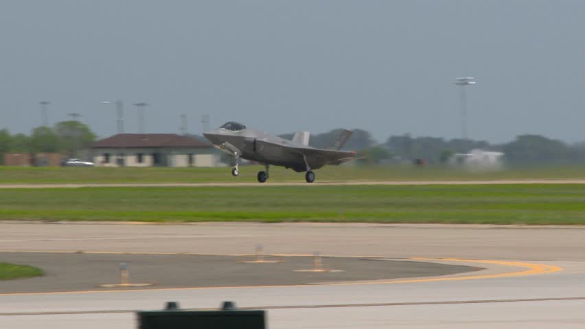 F-35A stealth fighter jet taking off and retracting its landing gear