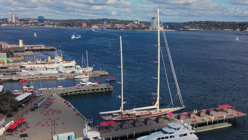 Scenic Top View Of Marina, Sailboats, Skyscrapers, And Glass Towers On Halifax Waterfront Promenade In Nova Scotia, Canada. Filmed In Cinematic Style During Autumn Morning.