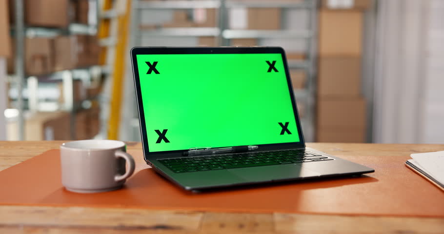 Logistics, green screen or laptop in warehouse for mockup, stock or inventory management in ux design. Distribution, chroma key or trade in depot with mug, export or cargo check for service delivery.