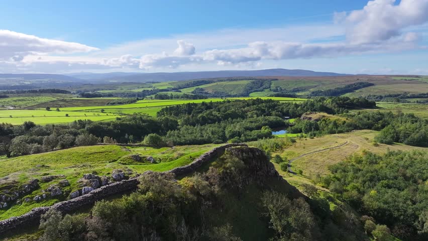Cinematic drone view of Hadrian's wall in Northumberland National park in Northern England, September 2025, Walltown, dramatic English Countryside