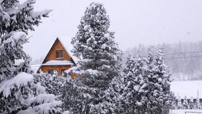 Snow wooden cabin in a quiet winter wonderland with falling snowflakes and frosted trees - Powered by Shutterstock - Get 15% off with code: PIKWIZARD15