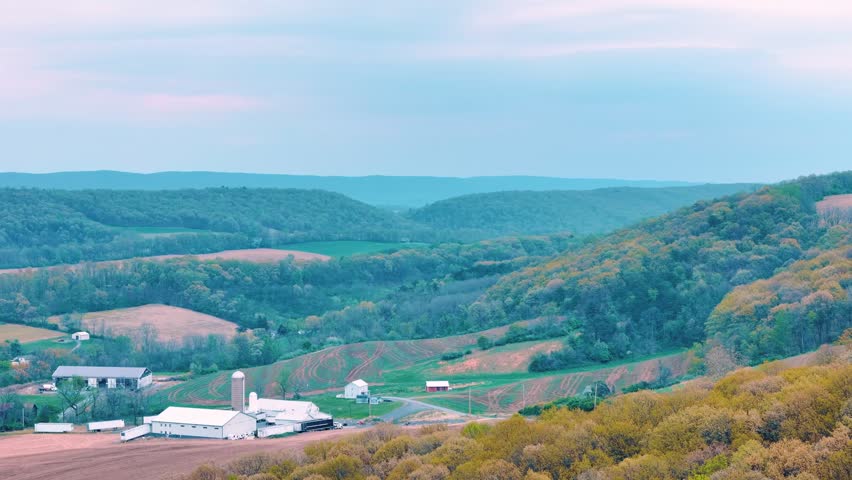Aerial landscape of corn fields farmland mountains sunset rural Appalachia Central Pennsylvania USA