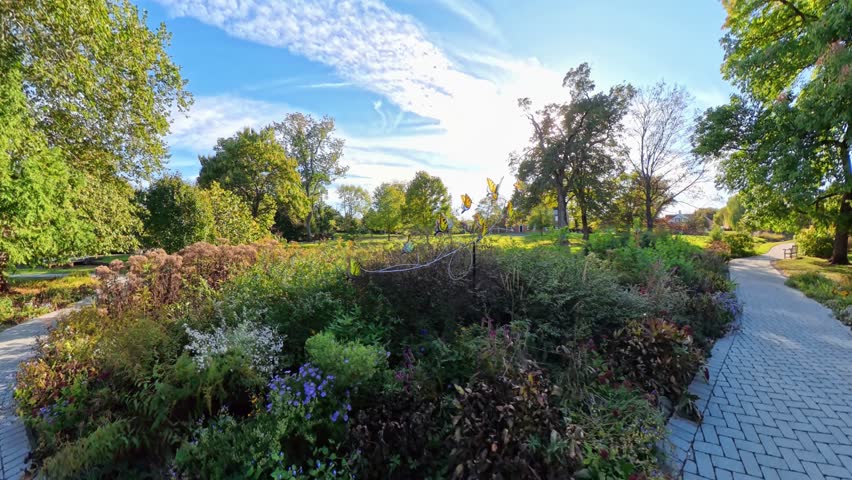 Discover the stunning outdoor views of the Shenandoah Gardens, showcasing lush landscapes, historical buildings, and vibrant plant life in Winchester, Virginia.