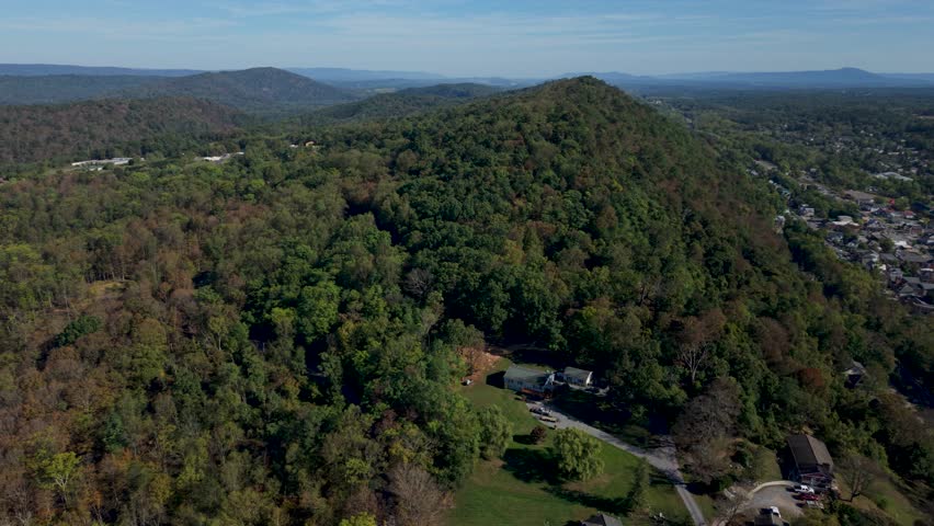Discover the scenic beauty of Berkeley Springs, West Virginia, with breathtaking aerial views showcasing lush landscapes, historic architecture, and charming homes.