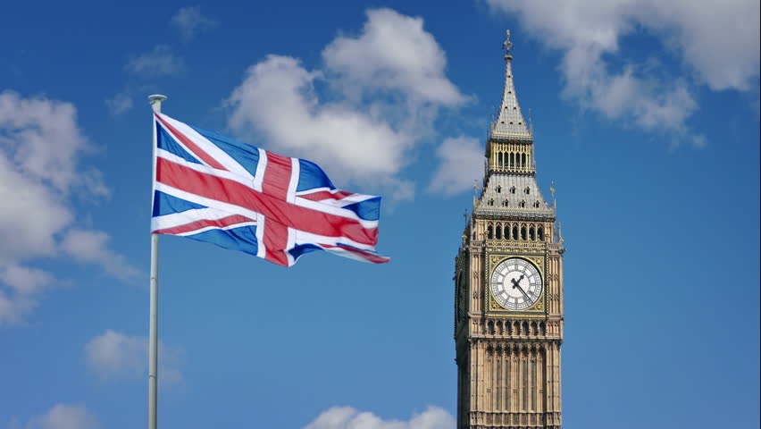 Big Ben Clock Tower With Flag Blowing