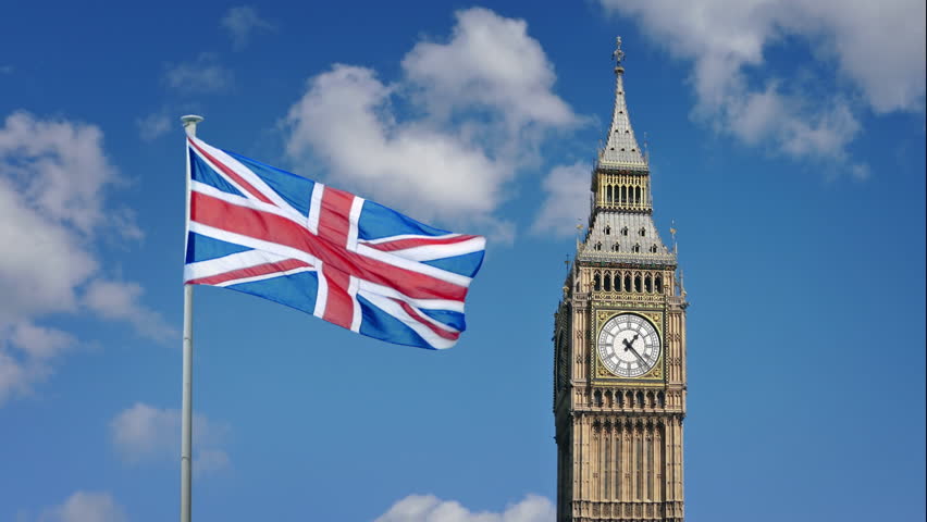 Big Ben Clock Tower With Flag Blowing