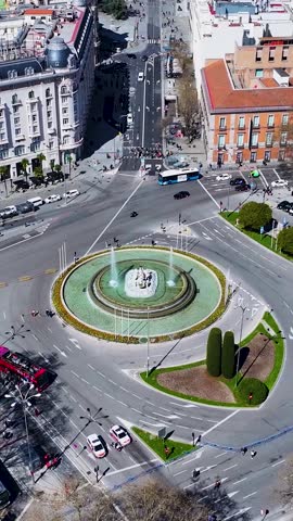 Neptuno Fountain At Madrid Spain. Famous Roundabout. Downtown Cityscape. Cultural Heritage Skyline. Neptuno Fountain In Spain. Madrid Street Scene.