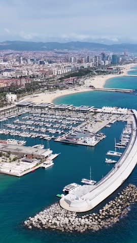 Port Of Barcelona At Barcelona In Catalonia Spain. Urban Beach. Bay Water Scenery. Downtown City. Port Of Barcelona At Barcelona In Catalonia Spain. Peaceful Landscape.