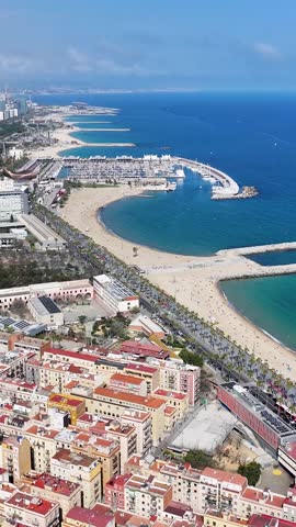Barceloneta Beach At Barcelona In Barcelona Province Spain. Urban Beach. Bay Water Scenery. Downtown City. Barceloneta Beach At Barcelona Spain. Peaceful Landscape. Spain Skyline.