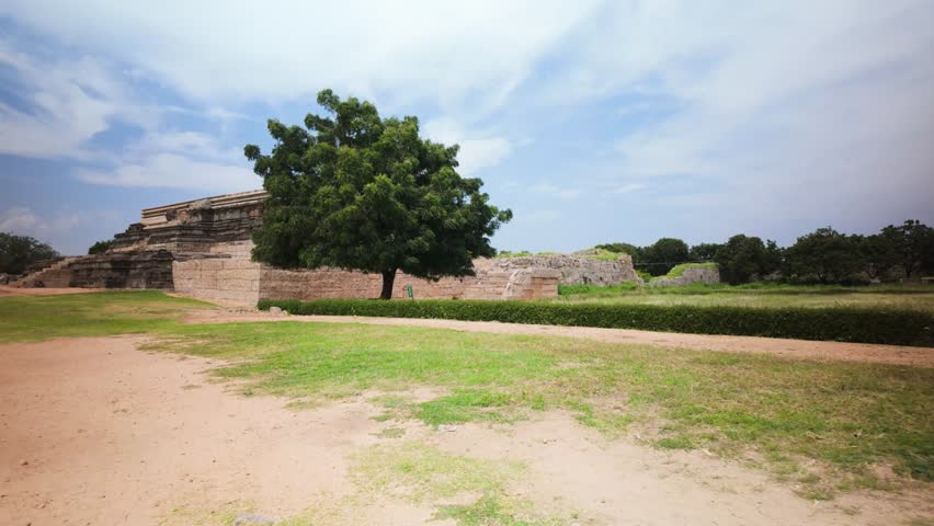 The ruins of the Vijayanagara Empire are located in Hampi, Karnataka, a UNESCO World Heritage Site that features over 1,600 surviving monuments, including temples, royal and sacred complexes.