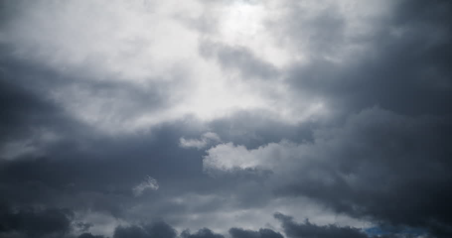 Timelapse of dark storm clouds foreboding very bad weather. Dramatic sky scene.
