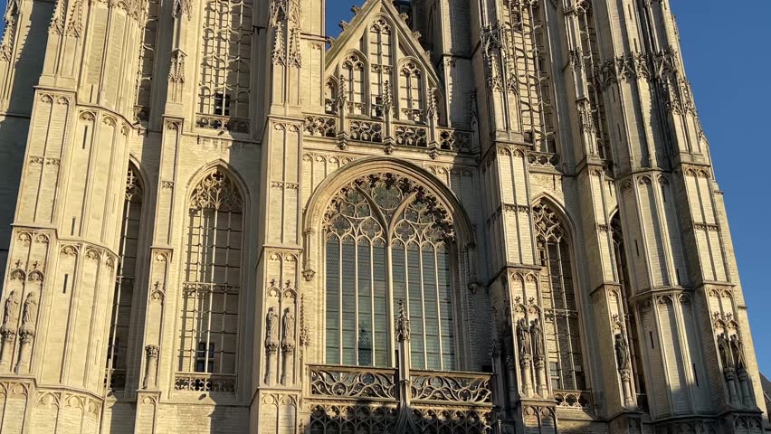 Cathedral of Our Lady, Antwerp, Belgium, looking up at the historic gothic architecture and intricate detailing of the facade. Antwerp, Belgium