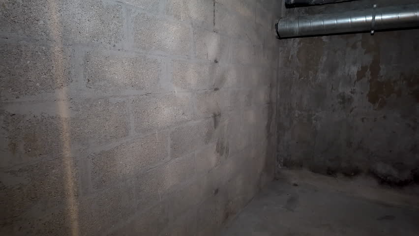 Pan right shot of individual basement in rental apartment building