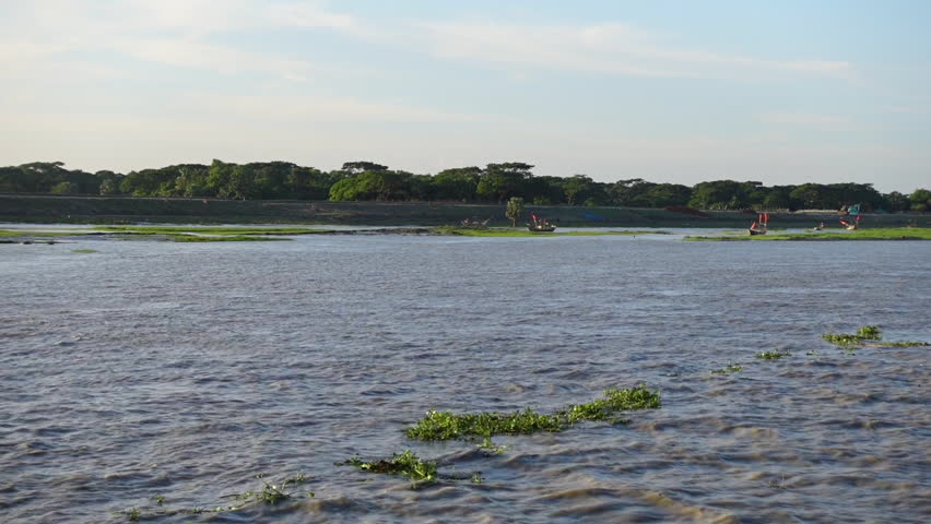 Beautiful view of the river from a moving ship in the late afternoon
