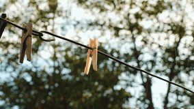 It's raining in summer, a clothespin in the foreground - Powered by Shutterstock - Get 15% off with code: PIKWIZARD15