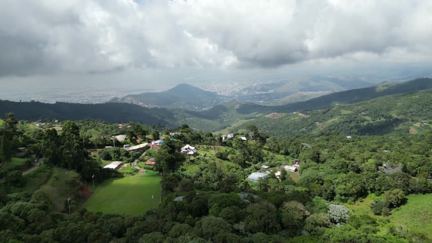 Aerial view of the lush hills around La Paz near Cali in the Valle del Cauca Department of Colombia, showing rural landscapes and panoramic views of the city in the background