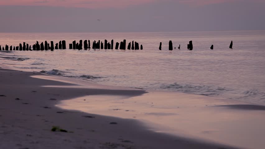 Sunset over Baltic Sea beach in Debki village, Puck County, Pomerania region of Poland