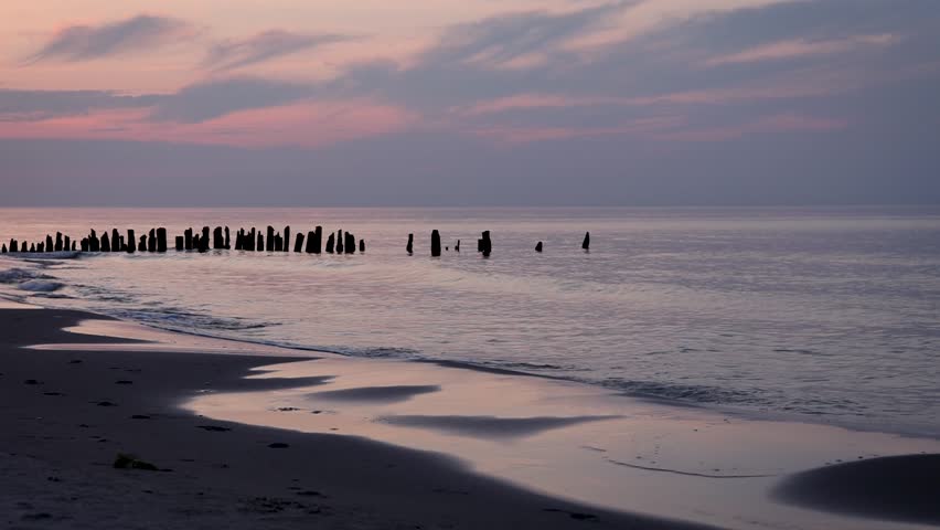 Sunset over Baltic Sea beach in Debki village, Puck County, Pomerania region of Poland