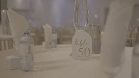 Elegant Wedding Reception Table Setting, Table Number 50 - Powered by Shutterstock - Get 15% off with code: PIKWIZARD15