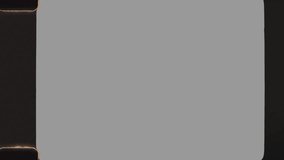 Vintage film strip running vertically overlay effect - Powered by Shutterstock - Get 15% off with code: PIKWIZARD15