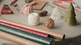 Tilt up shot of focused African American girl child writing warm wishes on Christmas card or letter to Santa together with joyful father while sitting at table in cozy living room - Powered by Shutterstock - Get 15% off with code: PIKWIZARD15