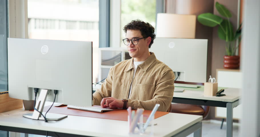 Creative, man and stretching with computer in office for work break, completed task and good news. Person, relax and stress relief with pc for productivity, finish project and employee satisfaction