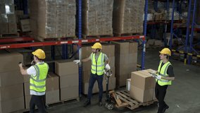 Blue collar workers are working at warehouse. Logistics, transportation. - Powered by Shutterstock - Get 15% off with code: PIKWIZARD15