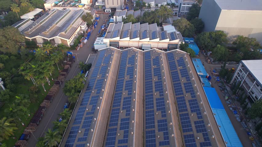 Solar panels rooftop of industrial building, Drone