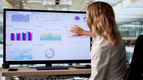 Office Desktop With Computer Displaying Business Analytics And Charts Data - Powered by Shutterstock - Get 15% off with code: PIKWIZARD15